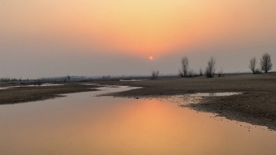 西辽河落日。水利部供图